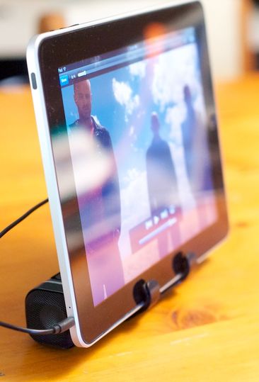 The "unofficial" way of using the Logitech tablet speakers -- as an iPad stand.